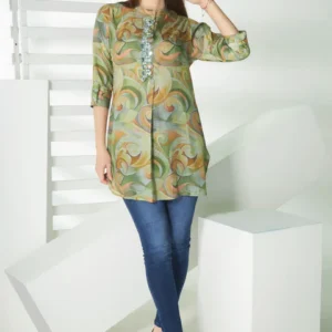 A green printed kurti with hand embroidery on the front placket